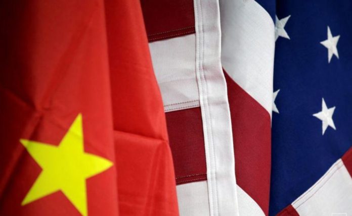 A chinese diplomat accuses the US for undermining the world economy and fighting the virus