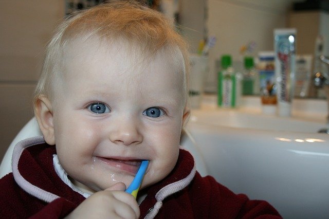Why does the taste of food change after brushing our teeth?