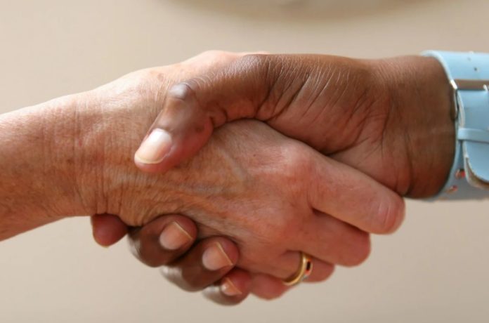A weak handshake could indicate health problems in men