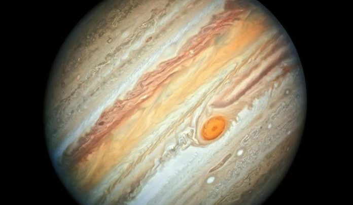 Why does Jupiter look striped?