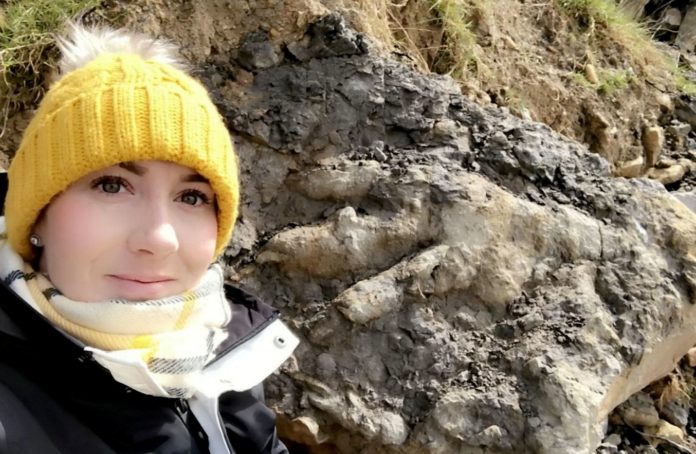 Woman who was collecting shellfish discovers the largest dinosaur footprint belonging to a 'Jurassic giant' megalosaurus