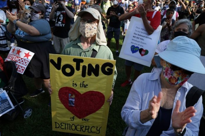 Thousands Protest Voting Rights at Two DC Rallies