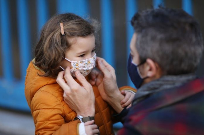 Mandatory mask-wearing for adults may help stop COVID spread in schools