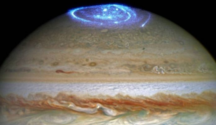 An electromagnetic 'tug of war' lights up Jupiter's auroras