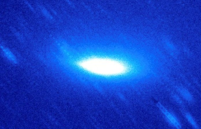 New study says Comet fading begins beyond Saturn