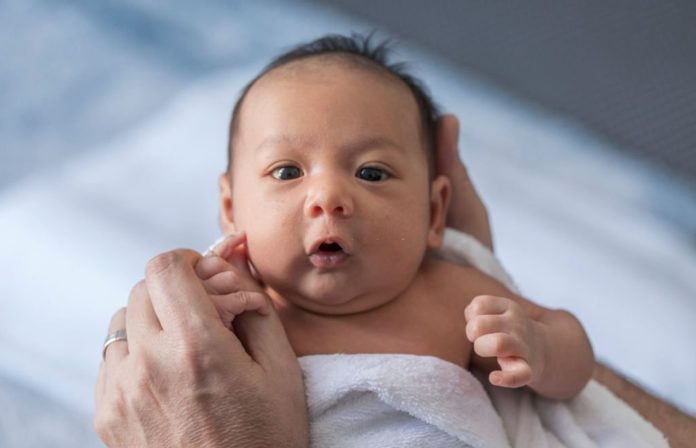Newborn babies' super strong smell has opposite effects on parents