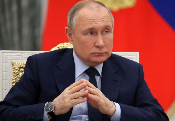 Vladimir Putin's popularity drops in Russia - new poll shows