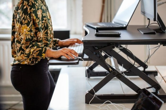 Standing Desk Helps Keep You Healthy At Work - New Study